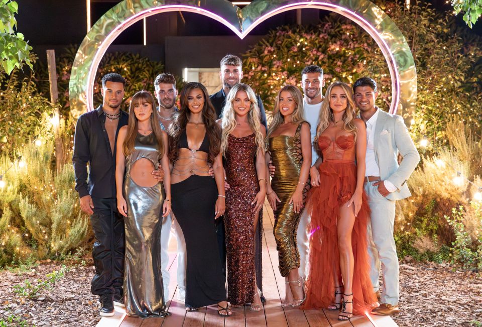 The cast of Love Island: All Stars posing for a group photo.