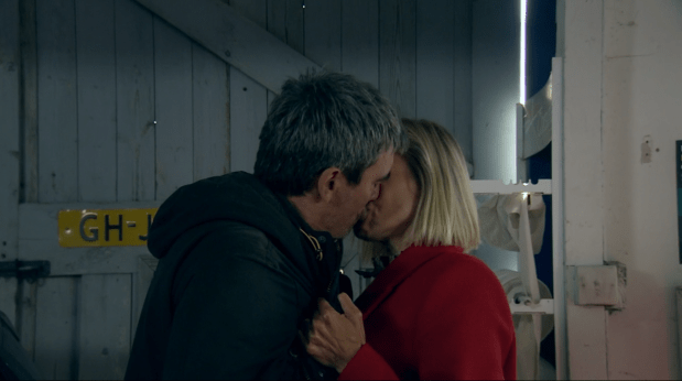 Cain and Ruby kissing.