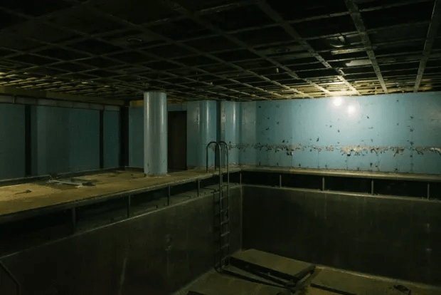 Abandoned indoor swimming pool.