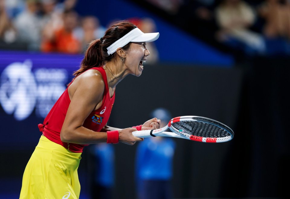 Gao Xinyu of China celebrates scoring at the United Cup tennis tournament.
