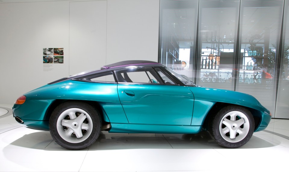 Teal Porsche Studie Panamericana on display.