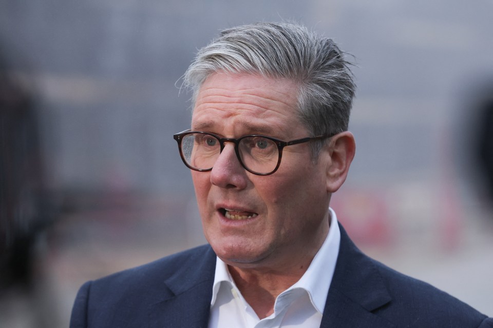 Prime Minister Keir Starmer speaking at a construction site.