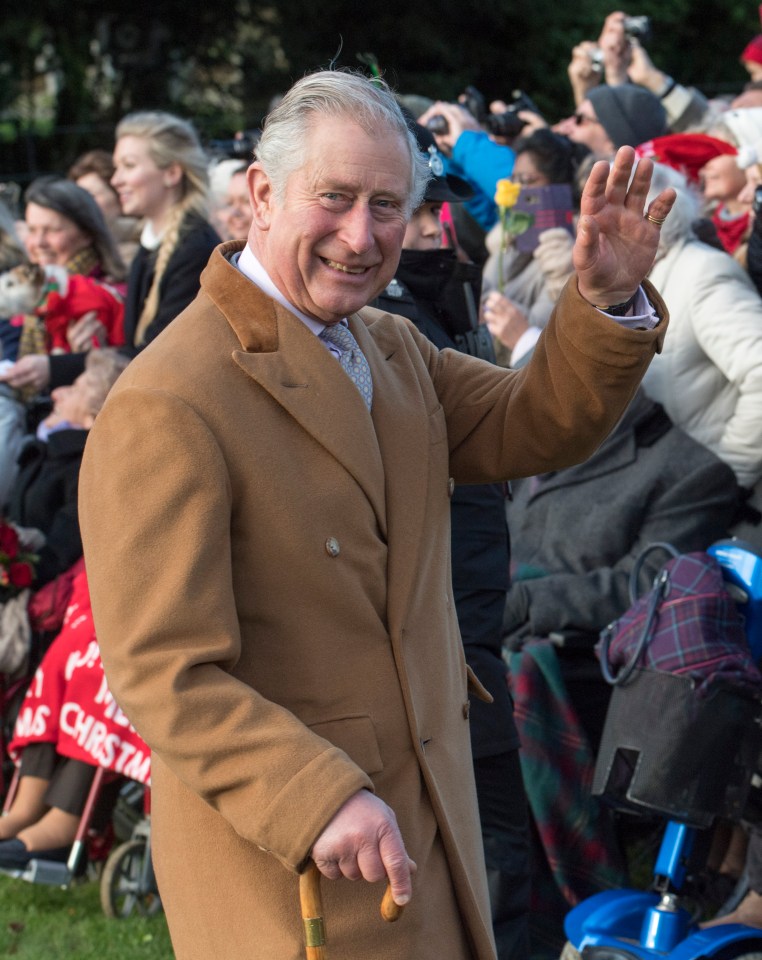 Prince Charles waving to well-wishers.