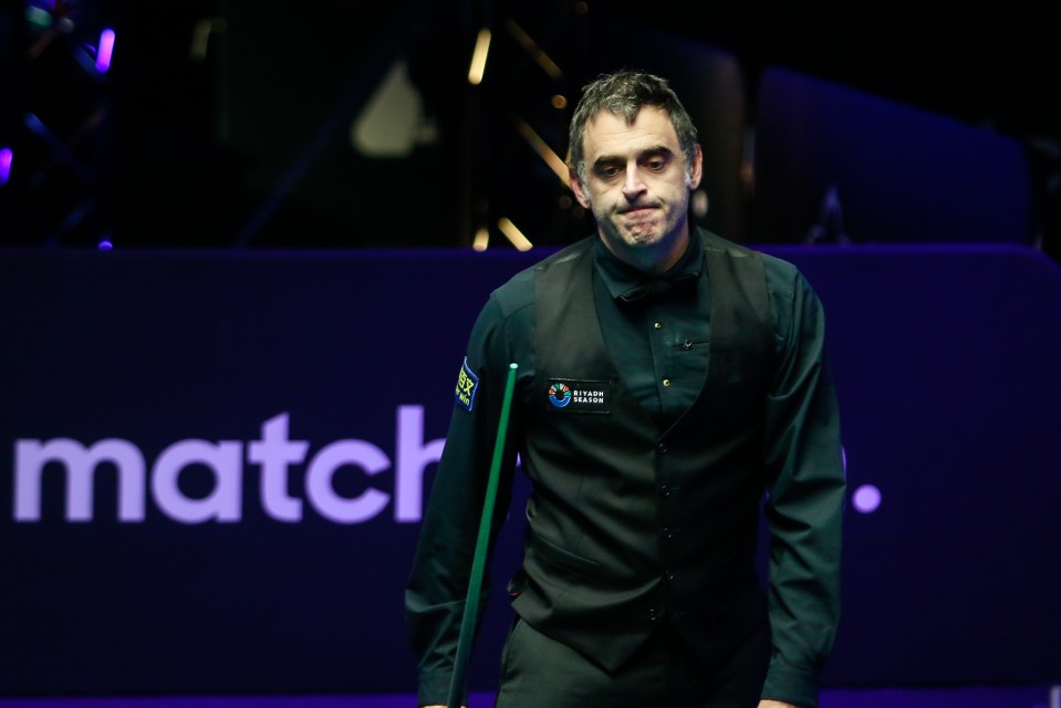 Ronnie O'Sullivan of England reacts during a snooker match.