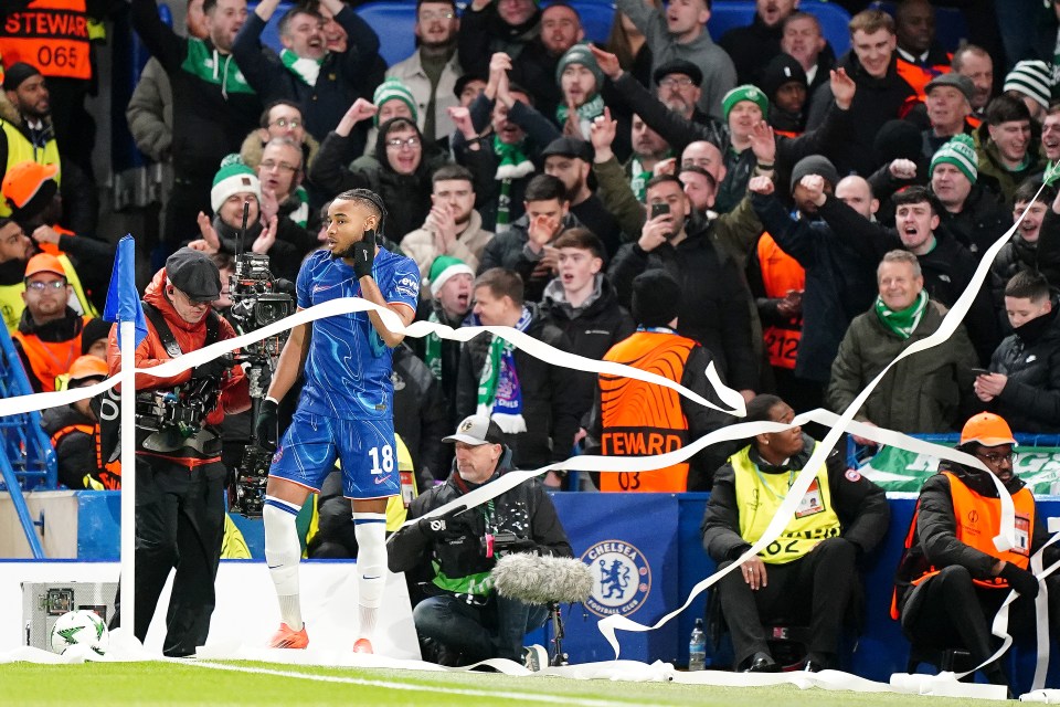 Chelsea's Christopher Nkunku is prevented from taking a corner by Shamrock Rovers fans throwing toilet paper.