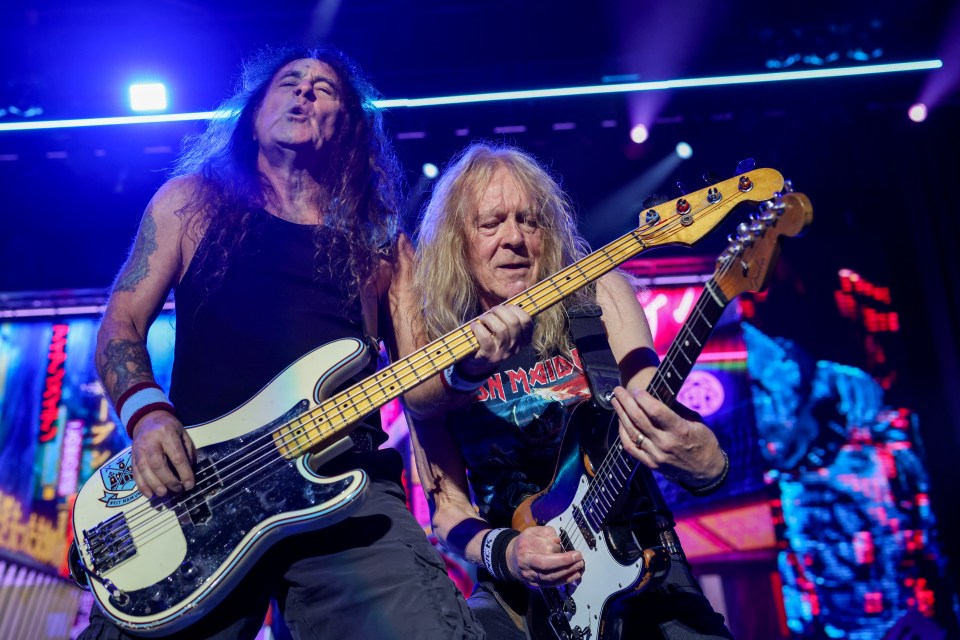 Steve Harris and Janick Gers of Iron Maiden performing live on stage.