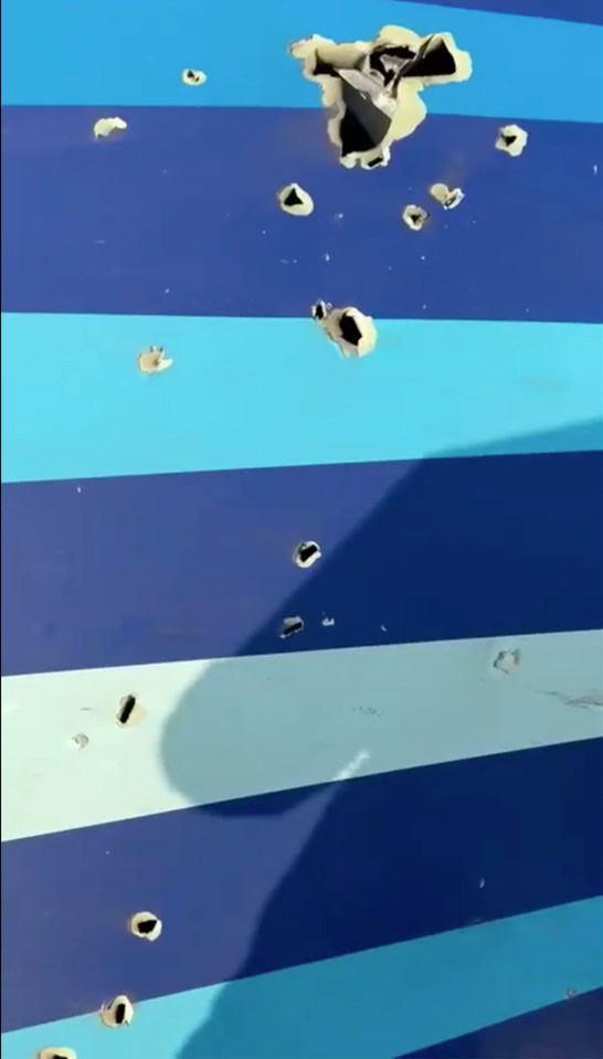 Suspected bullet holes in airplane wreckage.