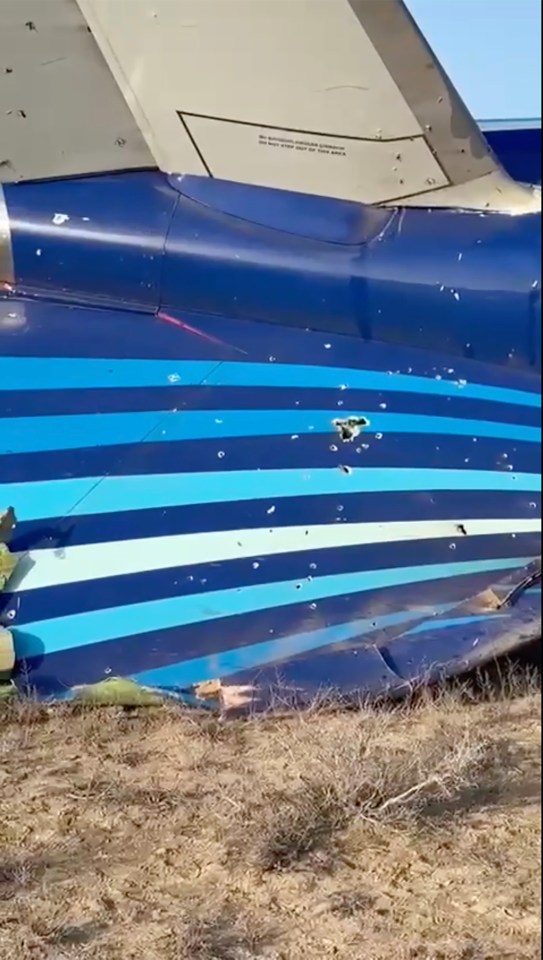 Suspected bullet holes in the wreckage of a plane.
