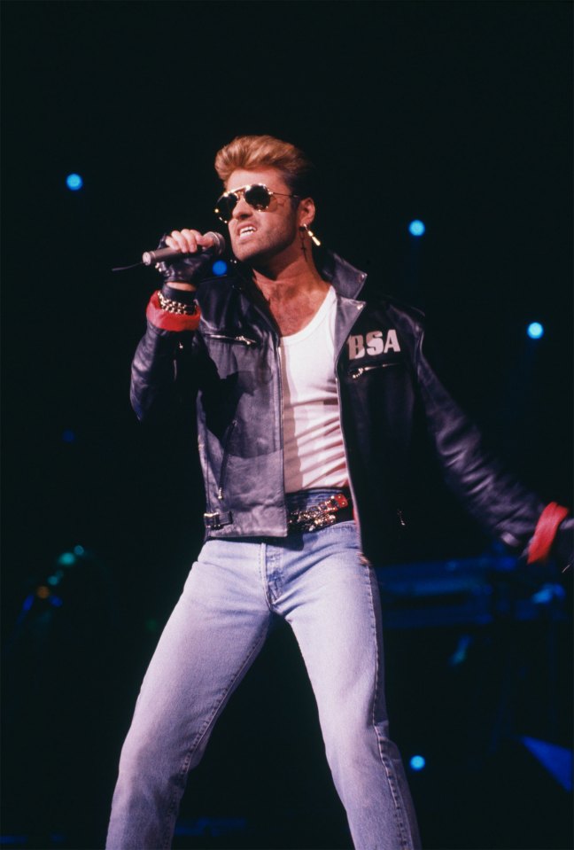George Michael performing on stage.