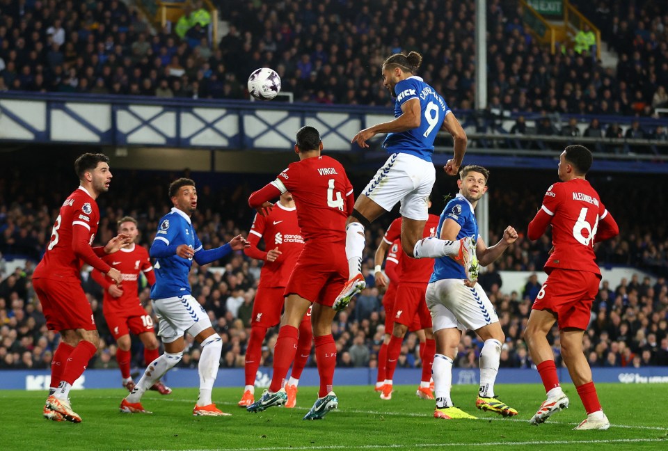 Everton's Dominic Calvert-Lewin heads the ball during a soccer match.