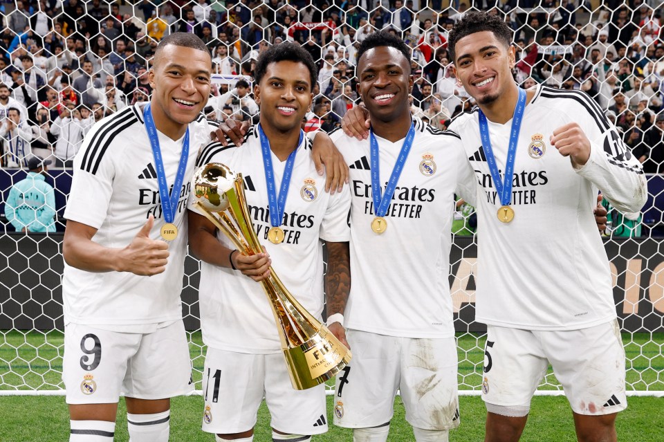Real Madrid players with the FIFA Intercontinental Cup trophy.