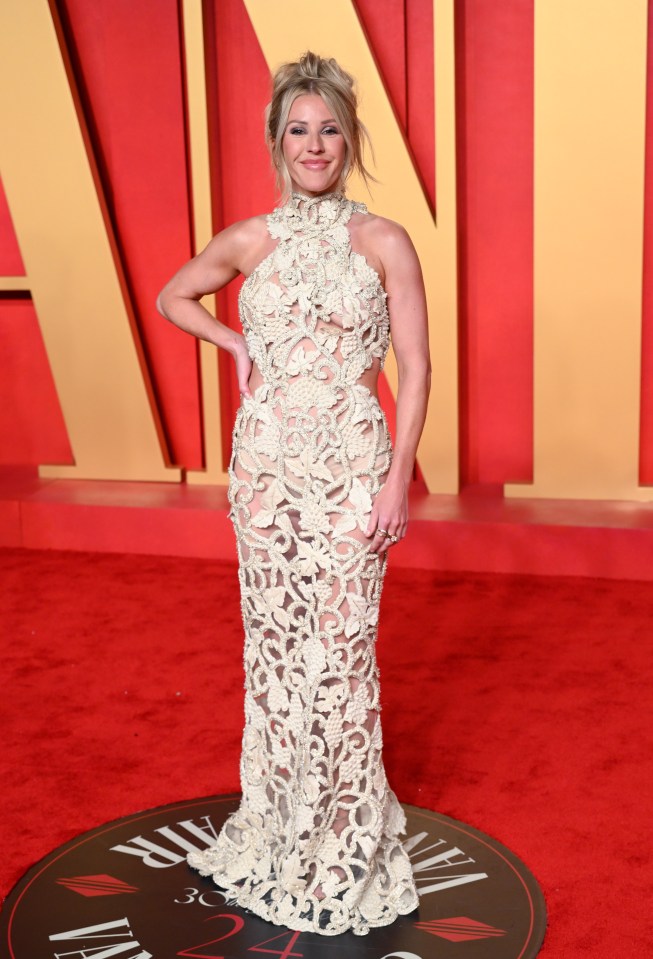 Ellie Goulding at the Vanity Fair Oscar Party in a cream-colored, floor-length gown.