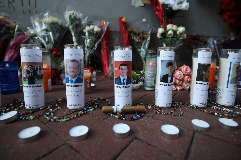 Memorial candles for victims of the Bourbon Street vehicular attack.