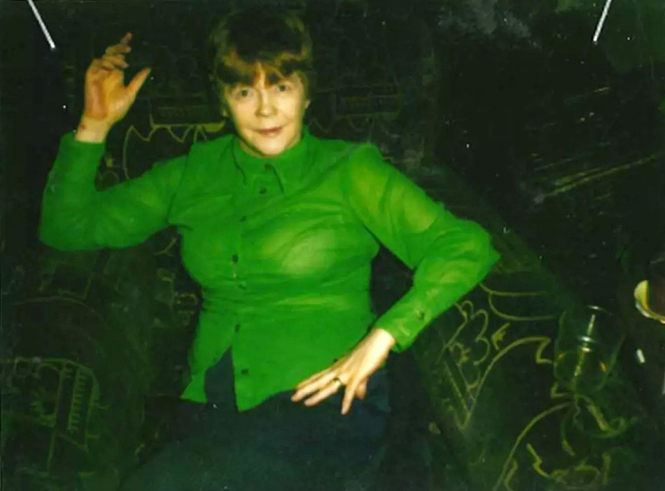 Photo of Mary McLaughlin in a green shirt.