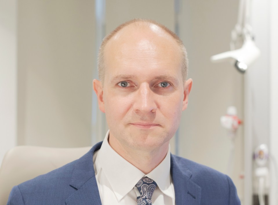 Portrait of Dr. Richard Lee, a consultant physician.