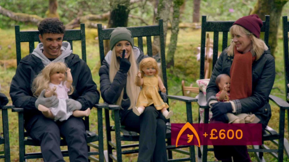 Four people sitting in rocking chairs, each holding an antique doll;  £600 shown on screen.