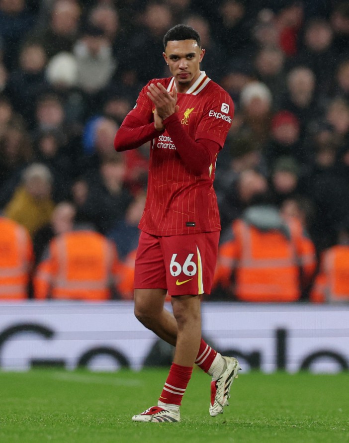 Soccer Football - Premier League - Liverpool v Manchester United - Anfield, Liverpool, Britain - January 5, 2025 Liverpool's Trent Alexander-Arnold applauds fans after being substituted REUTERS/Phil Noble EDITORIAL USE ONLY. NO USE WITH UNAUTHORIZED AUDIO, VIDEO, DATA, FIXTURE LISTS, CLUB/LEAGUE LOGOS OR 'LIVE' SERVICES. ONLINE IN-MATCH USE LIMITED TO 120 IMAGES, NO VIDEO EMULATION. NO USE IN BETTING, GAMES OR SINGLE CLUB/LEAGUE/PLAYER PUBLICATIONS. PLEASE CONTACT YOUR ACCOUNT REPRESENTATIVE FOR FURTHER DETAILS..