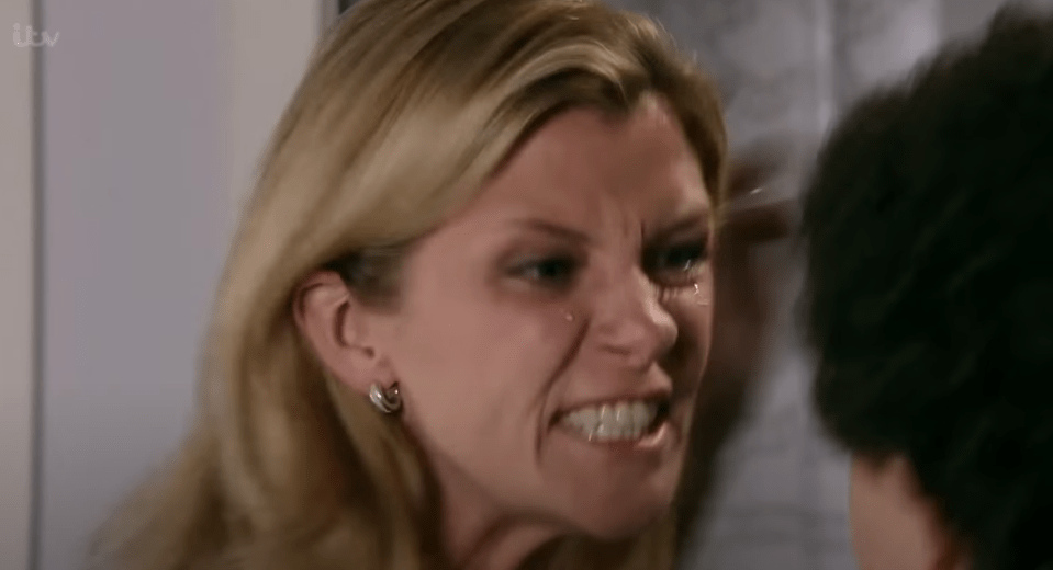 A blonde woman crying and yelling at someone.