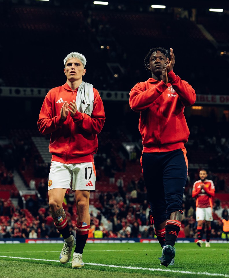 Alejandro Garnacho and Kobbie Mainoo of Manchester United applaud after a match.