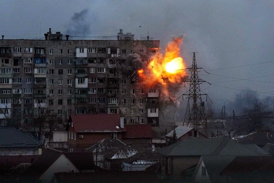 Explosion destroys an apartment building.