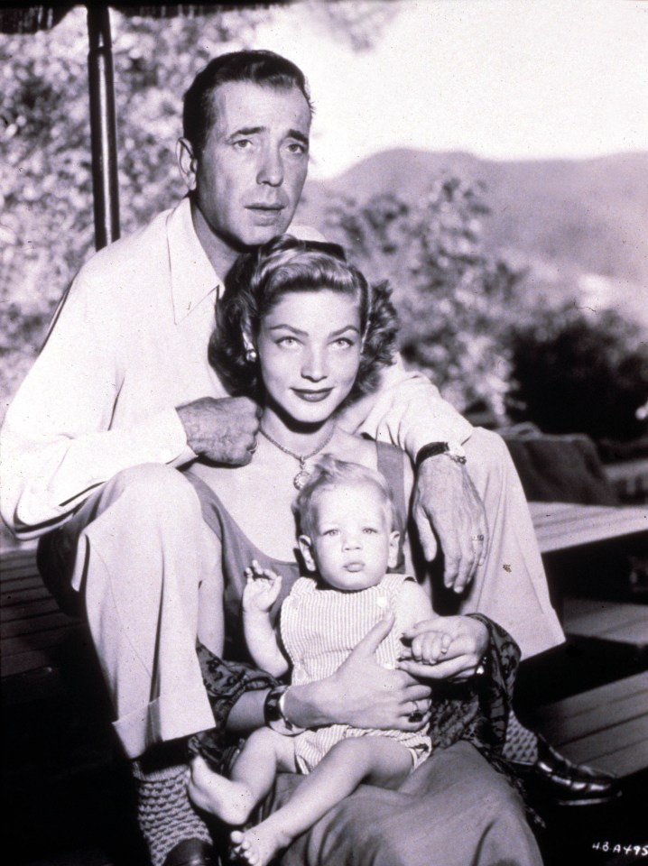 Humphrey Bogart, Lauren Bacall, and their baby son.