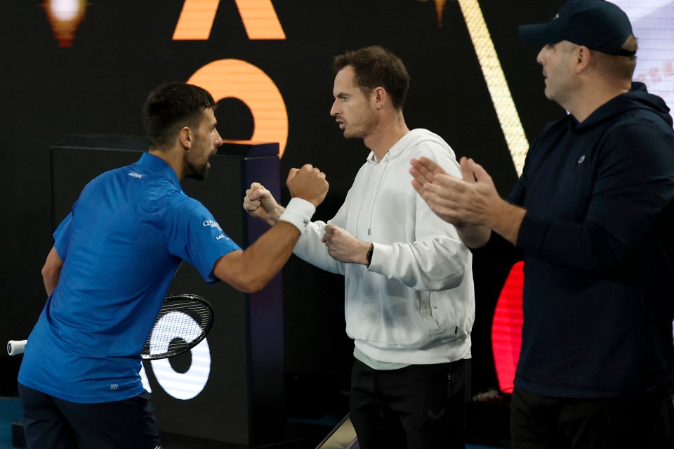 Novak Djokovic and Carlos Alcaraz shake hands after a tennis match.