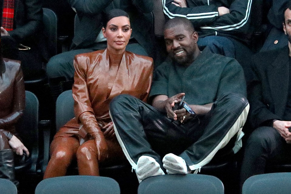 Kim Kardashian and Kanye West at the Balenciaga Paris Fashion Week show.