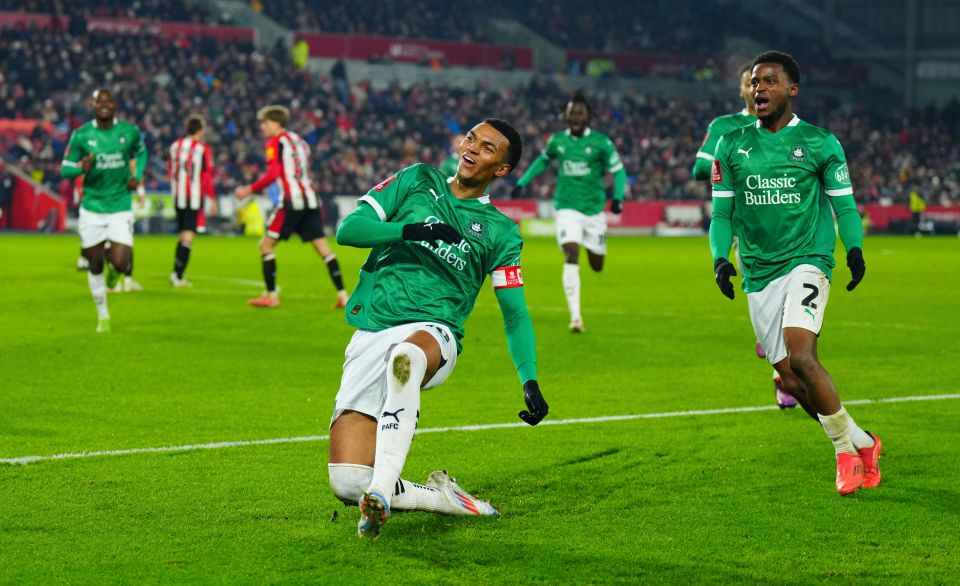 Soccer player celebrating a goal.