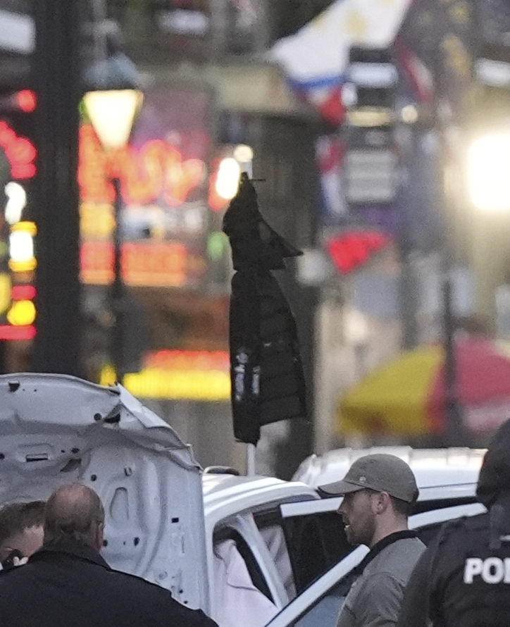 Emergency responders at a vehicle accident scene.
