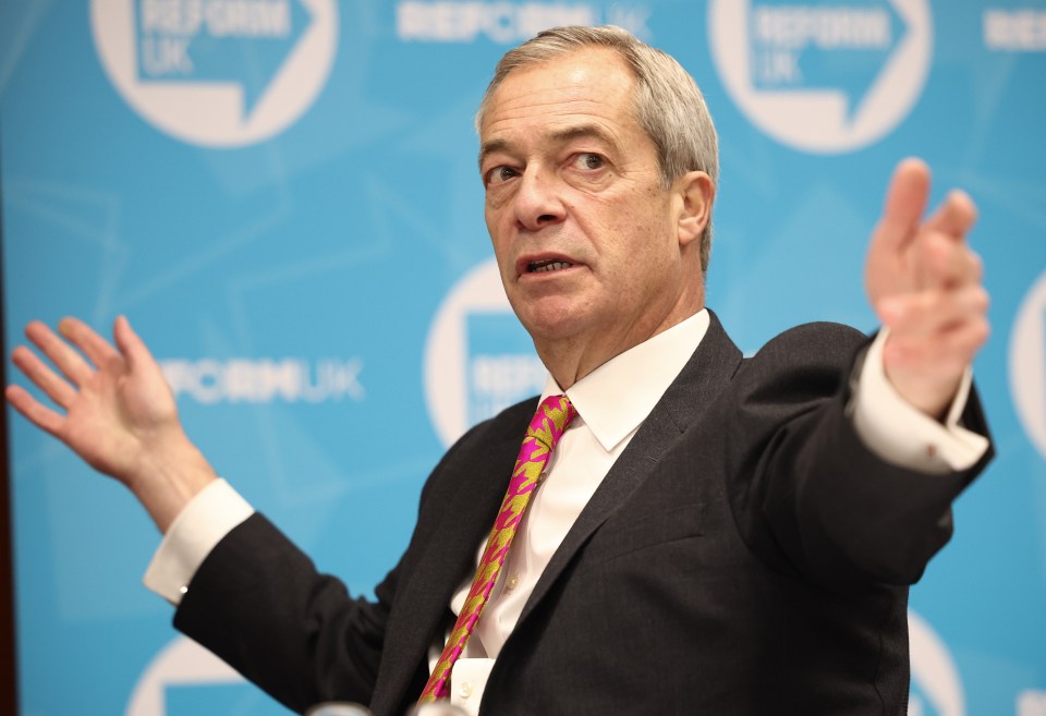 Nigel Farage gesturing during an interview.