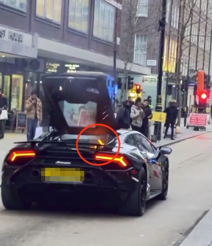 A Lamborghini Huracan Tecnica on fire on Baker Street in London.