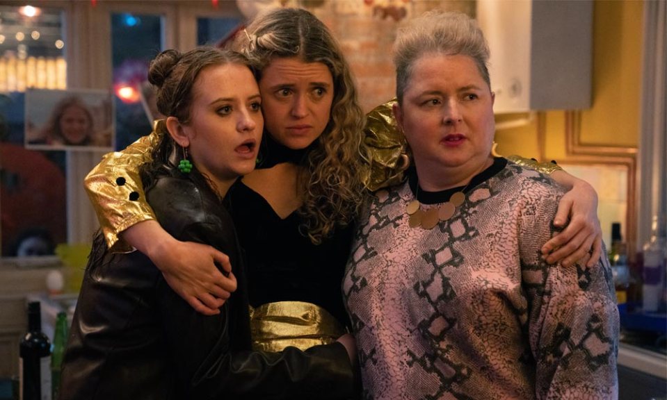 Three women from Extraordinary Season 2 huddle together.