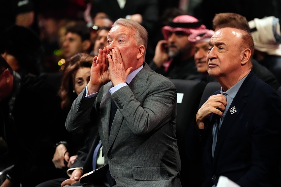 Frank Warren shouting at a boxing match.
