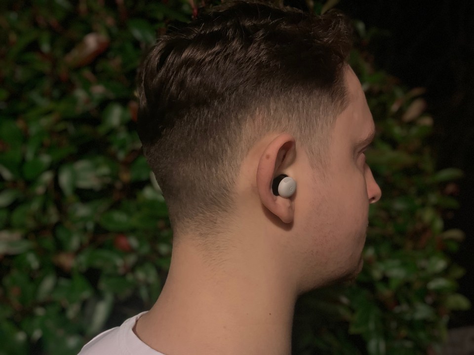 Person wearing Google Pixel Buds Pro.