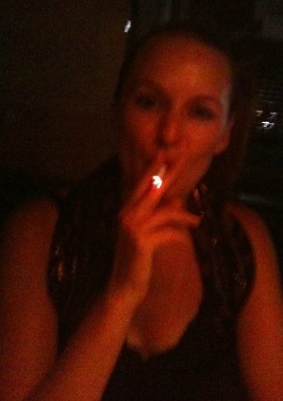 Woman smoking a cigarette.