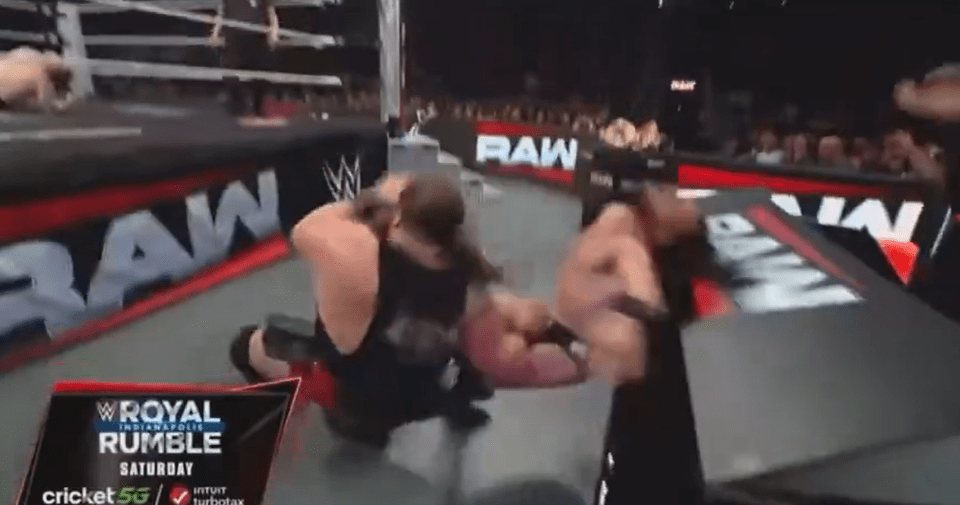 Two wrestlers fighting during the Royal Rumble.
