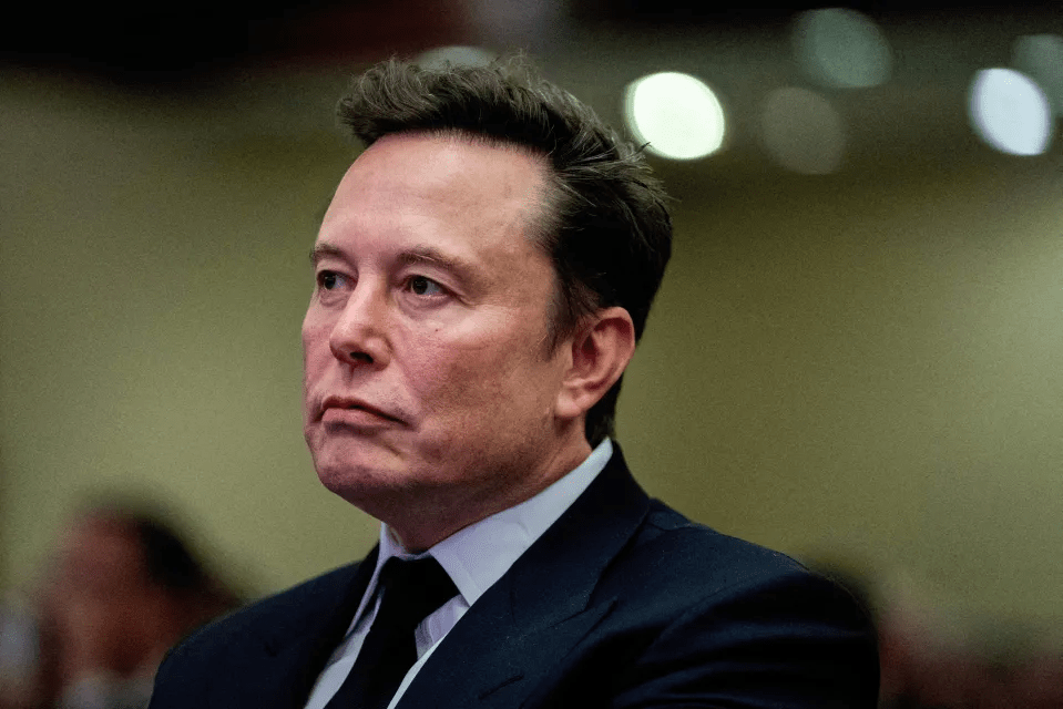 Elon Musk head and shoulders portrait.