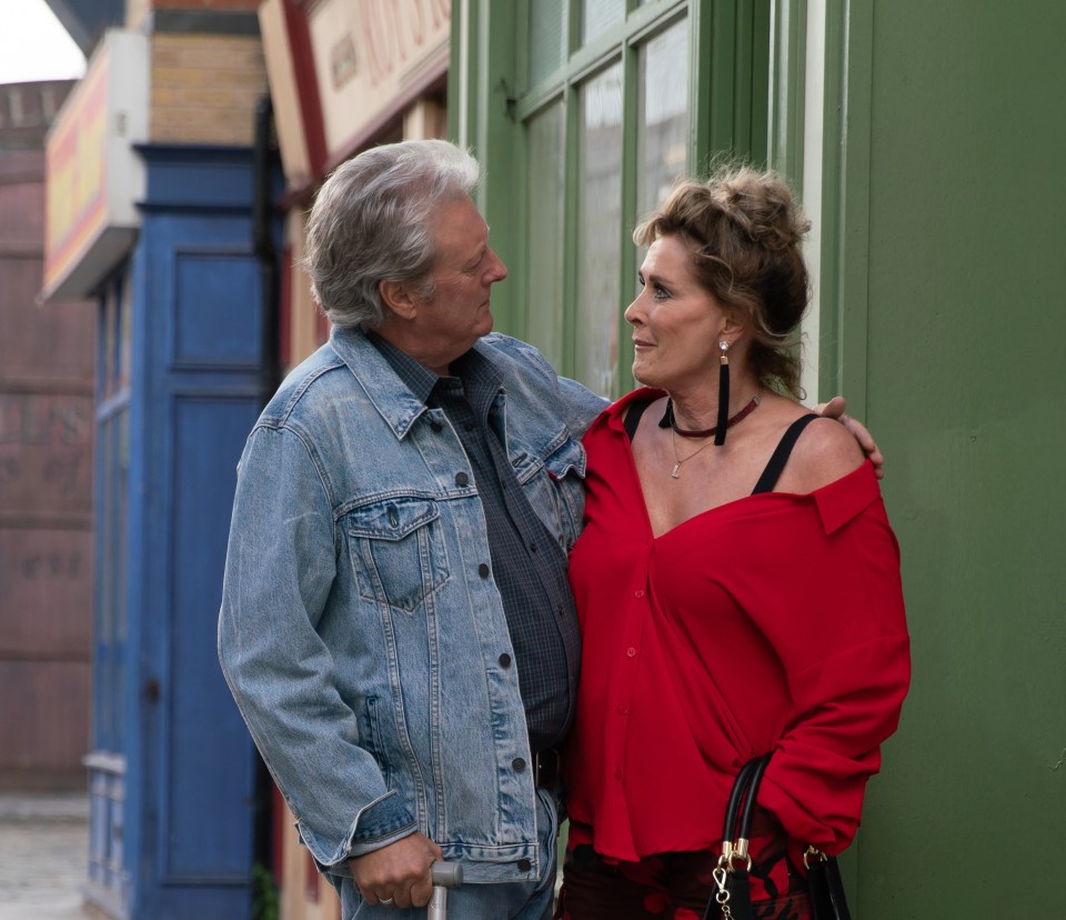 Liz McDonald and Jim McDonald embrace on Coronation Street.