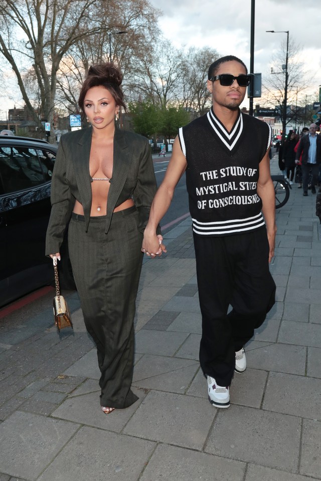 Jesy Nelson and Zion Foster holding hands at a music video screening.