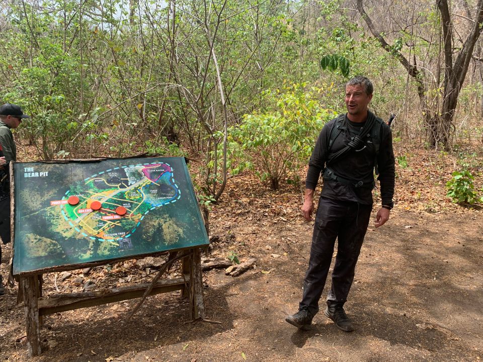 Bear Grylls explaining a map of "The Bear Pit."