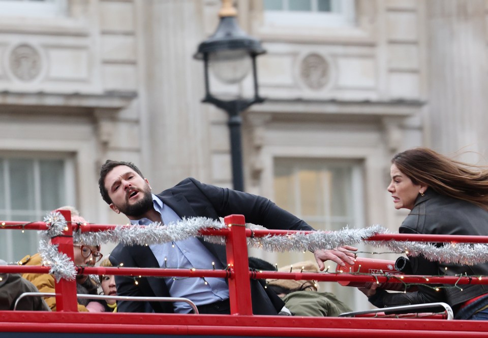 Kit Harington, Mark Wahlberg, and Michelle Monaghan filming a scene for "The Family Plan 2" in London.