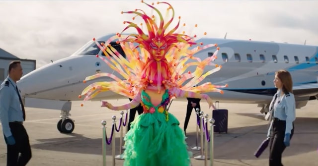 The Masked Singer's Toad costume at an airport.
