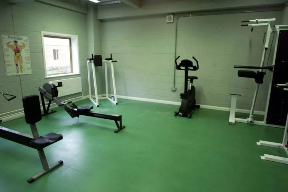 Gymnasium with exercise equipment.