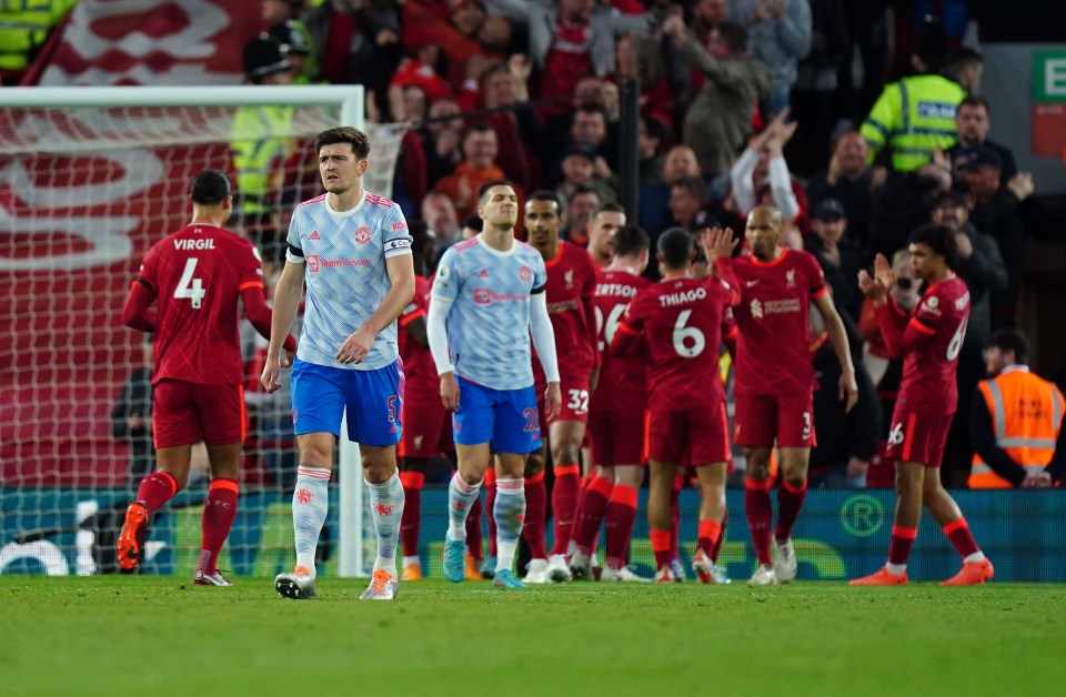 Harry Maguire of Manchester United looks dejected after Liverpool scores their second goal.