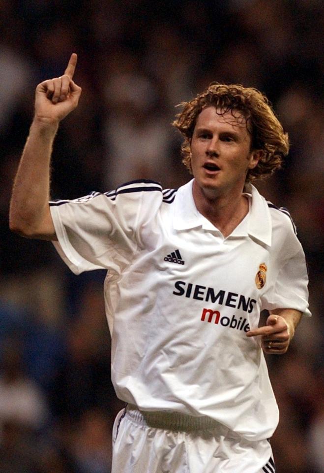 Steve McManaman of Real Madrid celebrates scoring a goal.