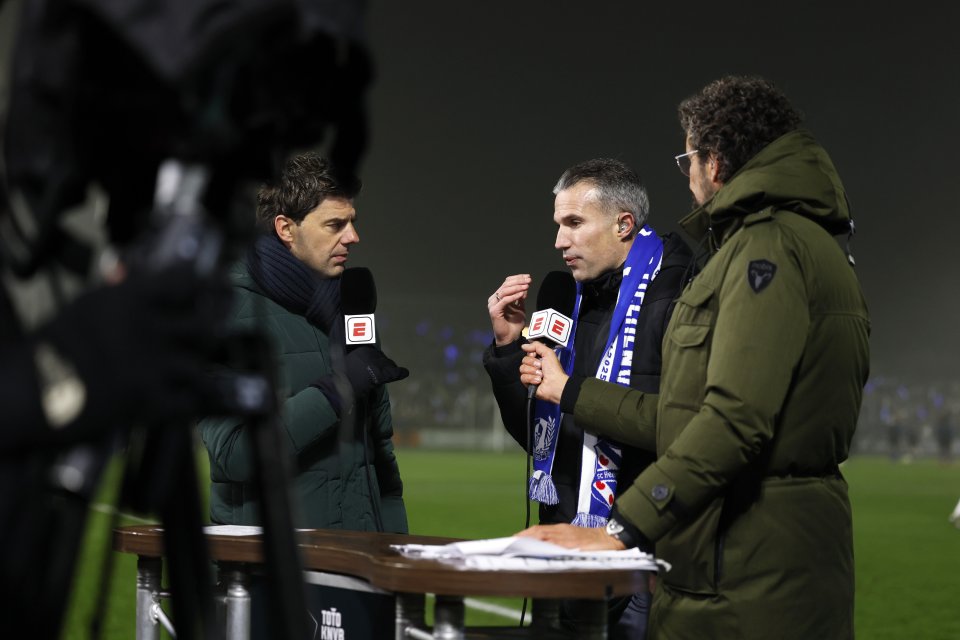 Robin van Persie, SC Heerenveen coach, being interviewed after a soccer match.