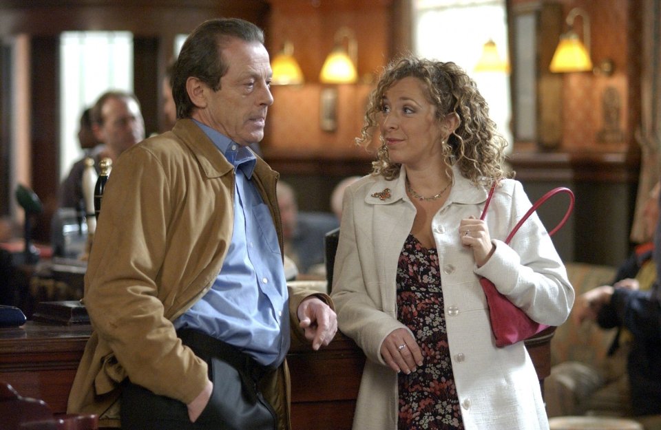 Leslie Grantham and Tracy-Ann Oberman as Den and Chrissy Watts in a scene from *EastEnders*.