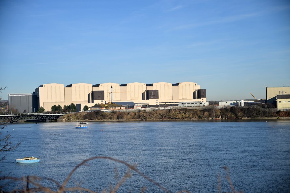 Submarine shipyard in Barrow, Cumbria, across a river.
