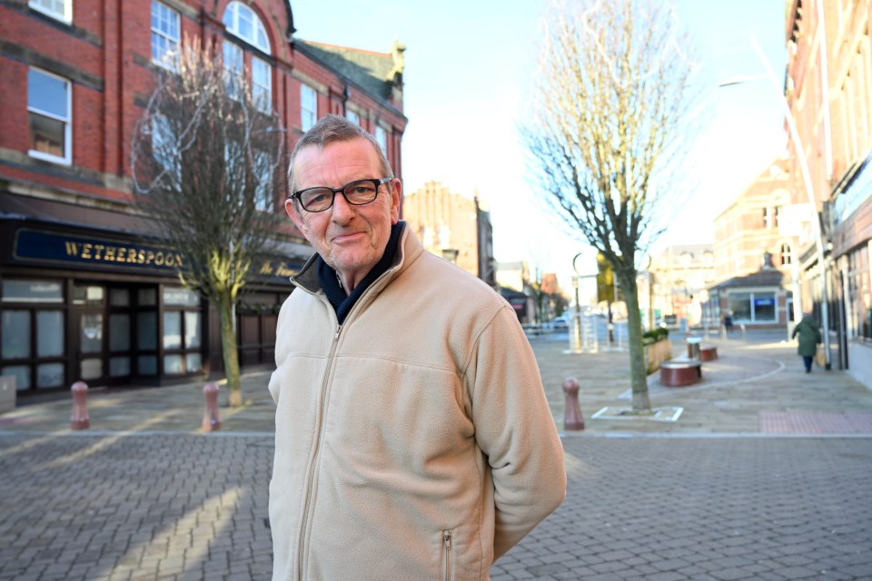 A man standing on a street, talking about the heroin problem in Barrow, Cumbria.