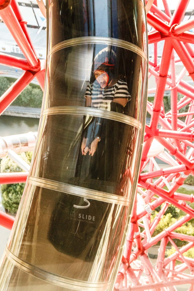 Person on the world's longest tunnel slide.